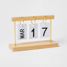 Decorate your office space while keeping track of the date with the Rubber Wood Desk Calendar from Threshold™. This calendar comes with three gold-tone rings that allow for easy changing of the day and month. Made with rubberwood, this desk calendar adds practical style to your desk. Threshold™: Quality & Design / Casual classics for house and home.