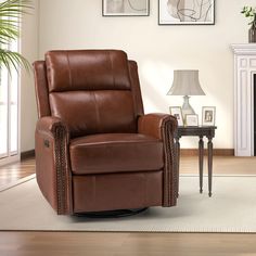 a brown recliner chair sitting in a living room next to a table with a lamp on it