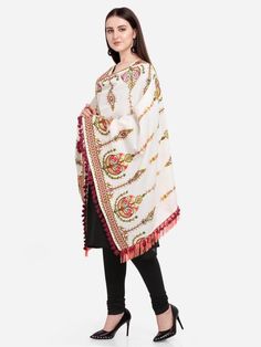 This Off-White shawl/dupatta is crafted in organic khadi cotton fabric. It is Heavily aari Embroidered with different kalash motif. It is fenced with wine dyed cotton tassel lace and fringe lace on both the ends. For winters it is perfect as a fancy shawl and for festive it is perfect to carry on your fancy outifit. Color: Off-white Fabric: 100% cotton base khadi Fabric Work Details: Embroidered, embellished with fancy laces and fringes Meausrements: Length - 200 CM Width - 75 CM Note: The produ Fancy Laces, Khadi Fabric, Fancy Shawl, Indian Scarf, Tassel Lace, Fancy Outfit, White Shawl, Stole Scarf, Embroidered Wedding