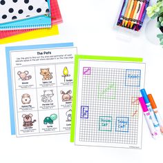 the pets worksheet is next to markers and crayons on a table