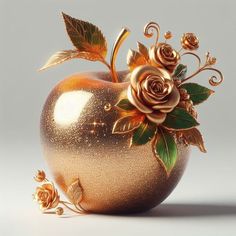 a golden vase with roses and leaves on it