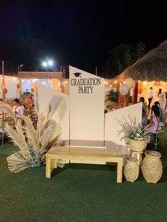 a graduation party with tables, chairs and decorations