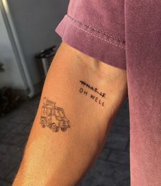 a person with a small tattoo on their arm