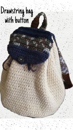 a crocheted bag with buttons on the front and side, hanging from a hook