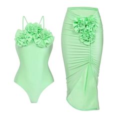 Introducing the Vicki Floral Embellished Swimsuit Set, an elegant and feminine ensemble designed to bring a touch of romance to your swimwear collection. This set features a beautifully embellished one-piece swimsuit paired with a coordinating cover-up, offering a cohesive and stylish look for any beach or poolside outing. Key Features: Floral Embellished Swimsuit: Elegant Design: The one-piece swimsuit is adorned with intricate floral embellishments, adding a sophisticated and romantic touch. Flattering Silhouette: Designed to enhance your natural curves, the swimsuit provides a snug yet comfortable fit, accentuating your figure. Supportive Features: Equipped with adjustable straps, a built-in bra, or removable padding, the swimsuit offers customized support and shaping. High-Quality Fabr Elegant Green Swimwear For Party, Elegant Halter Neck Swimwear For Beach Party, One-piece Swimwear For Beach Season Party, One-piece Party Swimwear For Beach Season, Party Beach Season One-piece Swimwear, Elegant Green Sleeveless Swimwear, Beachwear Tankini For Party, Elegant Green Swimwear For Beach Season, Elegant One-piece Swimwear For Beach Party