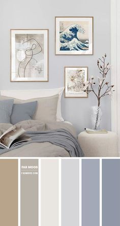 a bedroom with gray walls and pictures on the wall, along with grey bedding