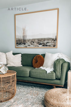 a living room filled with lots of furniture and decor on top of a carpeted floor