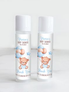 two personalized baby shower products on a white surface with the words, thank you for celebrating with us