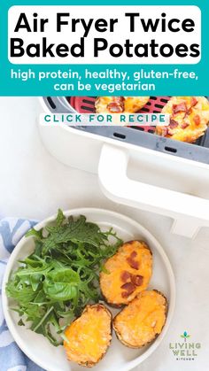 an air fryer with baked potatoes and greens on the side, next to a bowl of salad