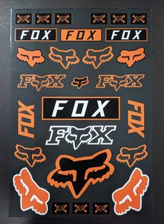 an image of fox stickers on a black background with orange and white lettering that says fox