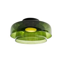 a green and black light fixture on a white background with no one in it's life