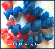 red, white and blue hair bows on a table