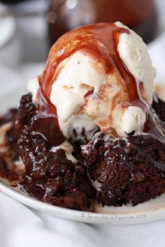 a plate topped with ice cream and chocolate cake