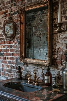 a bathroom sink sitting under a mirror next to a brick wall