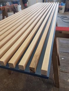 some wood planks sitting on top of a table