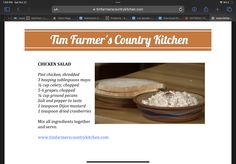 the website for tim farmer's country kitchen is displayed on a computer screen, with an image of chicken salad in a bowl