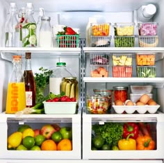 an open refrigerator filled with lots of different types of fruits and vegetables in it's doors