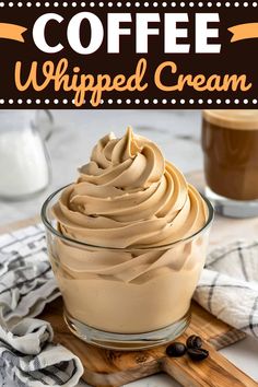 coffee whipped cream in a glass bowl on top of a wooden cutting board next to a cup of coffee