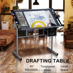 a black and white drawing table with drawers on the bottom is labeled drafting table 60'long adjustable glass space