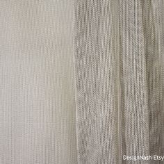 two different shades of white sheer fabric