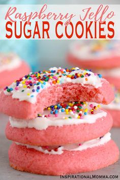 raspberry telle sugar cookies with white frosting and sprinkles