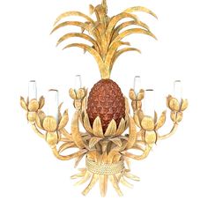 a pineapple chandelier with five glasses on it's bottom and four arms