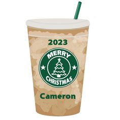 a starbucks cup with a merry christmas tree on the side and a straw sticking out of it