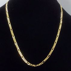 This Beautiful Necklace Is Made Of 10k Yellow Gold And Weighs 5.1 Grams. The Figaro Chain Style Is Perfect For Everyday Wear Or To Add A Touch Of Elegance To A Special Outfit. The Lobster Closure Ensures A Secure Fit And The 24 Inch Length Is Comfortable For Most People. This Necklace Is Perfect For Those Who Appreciate High-Quality Jewelry And Want To Add A Classic Piece To Their Collection. Gold Figaro Chain, Figaro Chain Necklace, The Lobster, Figaro Chains, Figaro Chain, Beautiful Necklace, High Quality Jewelry, Chain Styles, Quality Jewelry