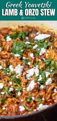 this greek dish has lamb and orzo stew in it with feta cheese on top