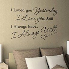 a bedroom with a wall decal that says i loved you yesterday, i love you still always have i always will