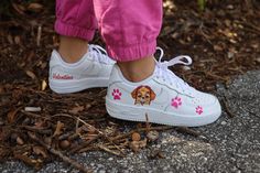 Meet our Paw Patrol Toddler Girl Air Force 1 Low Custom Kids Shoes! Hand-painted with playful Paw Patrol designs, these AF1 sneakers are perfect for daily adventures. Comfortable and eye-catching, they'll elevate her style effortlessly. Shop now and let her imagination soar! Hand/spray painted paw patrol girl design. Personalize with name (optional) Resistant clear coat (protected against cracks and scratches). Custom made-to-order sneaker. Brand new 100% authentic Nike AF1 Low with box! Free shipping within the US territory! Need a different color? Let us know which color you're looking for and we'll find it for you. Have an idea for your custom painted sneakers? Please send us a message here. We'll get back to you within 48hrs! Fun Hand-painted High-top Sneakers, Fun Hand Painted High-top Sneakers, Playful White Customizable Sneakers, Casual Hand-painted Sneakers, Sporty Hand Painted Custom Sneakers With Round Toe, Sporty Custom Hand-painted Sneakers With Round Toe, Casual Hand Painted Custom Sneakers With Round Toe, Hand Painted Round Toe Sneakers For Fun, Sporty Hand-painted Custom Sneakers