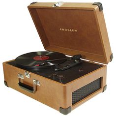 an old - fashioned record player is open and ready to play