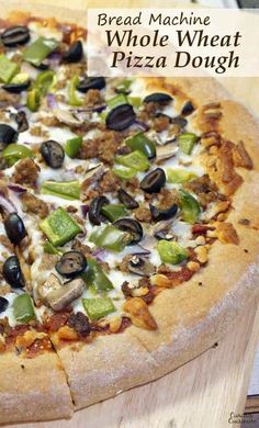 a pizza sitting on top of a wooden cutting board