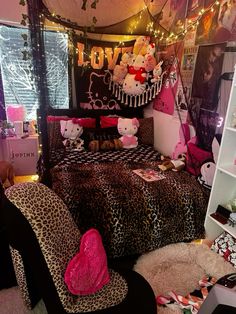 a bedroom decorated in pink and leopard print