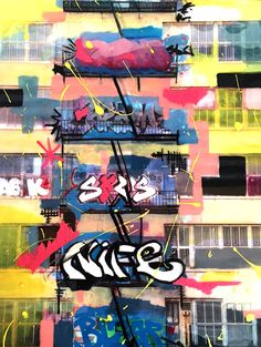 an abstract painting with graffiti on the side of a building in front of windows and balconies