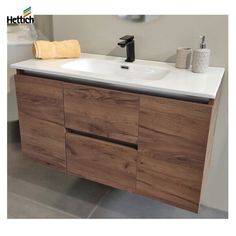 a bathroom vanity with two drawers and a sink