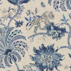 a blue and white wallpaper with an animal design on the front, surrounded by flowers