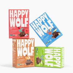 three boxes of happy wolf chocolate are stacked on top of each other in front of a white background