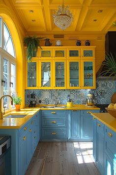 a kitchen with blue cabinets and yellow counter tops