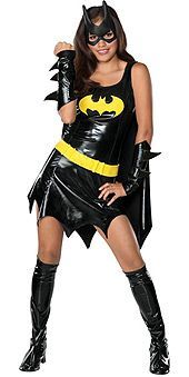 a woman dressed in a batgirl costume