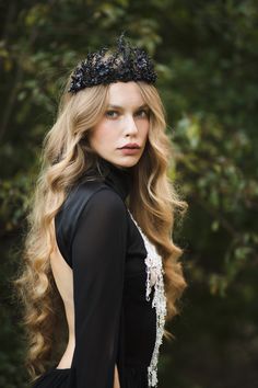 Wedding flower crown. The flower crown is made of artificial flowers, leaves, grass, wire, floristic tape and other trinkets used for arranging. Photo: Michaela durisova photography Dress: Chotronette Model: Kristína Szegényová The flowers are dyed/sprayed with black spray. When stored in dry and dark place, our products last 10-15 years. We can also make you other matching accessories. Please message me for more information. :) ---------------------------------------------------------------- SH Black Flower Crown, Tiara Black, Halloween Crown, Queen Tiara, Crown Handmade, Bridal Flower Headband, Floral Hairband, Queens Tiaras, Wedding Hairband