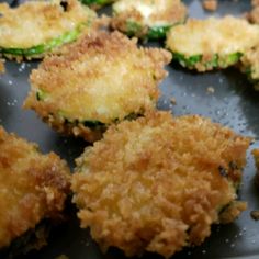 fried zucchini on a frying pan ready to be cooked