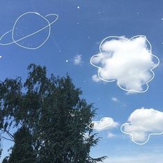 the sky is filled with white clouds and some small objects floating in it's reflection