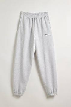 Classic joggers by iets frans… with tonal logo embroidery. Fitted with elasticated trims at the waist and hems. Urban Outfitters exclusive. Features iets frans... embroidered logo jogger sweatpants Embroidered joggers from iets frans… Tapered silhouette Elasticated trims UO exclusive Content + Care 50% Cotton, 50% polyester Machine wash Imported Size + Fit Model in Cream is 5'10" and wearing size Medium Measurements taken from size Medium Rise: 12" Inseam: 29.5" Leg opening: 4.75" | iets frans... iets frans… Embroidered Logo Jogger Sweatpant in Grey at Urban Outfitters Text Embroidery, Wishlist Clothes, Logo Text, Grey Sweatpants, Grey Joggers, Ankle Cuffs, Jogger Sweatpants, Logo Embroidery, Jeans For Sale