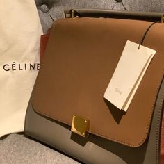 This Is An Authentic Celine Suede Calfskin Medium Tri-Color Trapeze. This Stylish Multicolor Tote Is Crafted Of Suede Calfskin Leather. It Features Black Rolled Leather Top Handle With Optional Shoulder Strap, Polished Gold Hardware, And White Leather Trapeze Sides With Snap Closures. The Flap Opens To A Burnt Orange Microfiber Interior With Patch Pockets. This Bag Has Been Worn A Few Times And Is Well Cared For. This Is A Gorgeous Everyday Bag, With The Sophistication And Style Of Celine! Celine Trapeze, Trapeze Bag, Celine Bags, Everyday Bag, Orange Gold, Tri Color, Kate Spade Crossbody, Leather Top, Burnt Orange