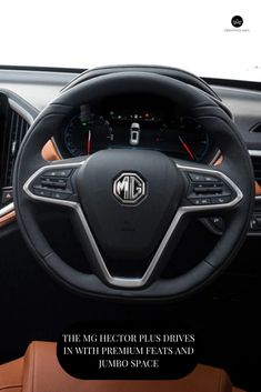 the steering wheel and dashboard of a car with an advertise for m & m