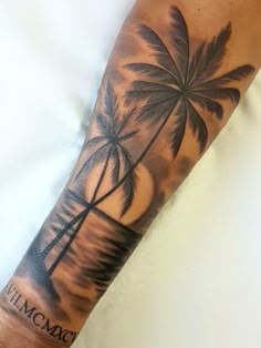 a man with a palm tree tattoo on his arm