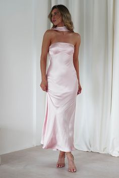 Highlights Stunning satin maxi dress Built in neck scarf Available in Pink & Blue Sizing The model is 5'10 and wears UK size 8 / S / US size 4 Fit & Fabric Made from 100% Polyester  Rear zip Not lined Length from top of shoulder to hem: 133cm Stretch:  5/10 Perfect for  Wedding guest Graduations Christenings an Pastel Pink Bridesmaid Dresses, Light Pink Bridesmaids, Light Pink Bridesmaid Dresses, Oh Hello Clothing, Dress Light Pink, White Bridal Dresses, Pink Long Dress, Maxi Dress Wedding Guest, White Bridesmaid Dresses