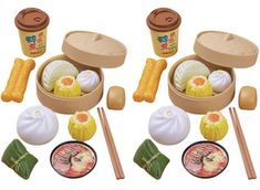 an assortment of food items are shown in the box with chopsticks and saucers