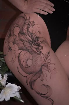 Jaw-Dropping Dragon Hip Tattoo Dragon Tattoo Hip, Hip Tattoos For Women, Floral Hip Tattoo, Flower Tattoo On Ribs, Hip Tattoos, Dragon Tattoo For Women, Ornamental Tattoo